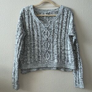 Cable knit sweater. White/black threading. Good used condition size sm/med